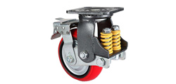 What spring is used for shock-absorbing caster wheel?
